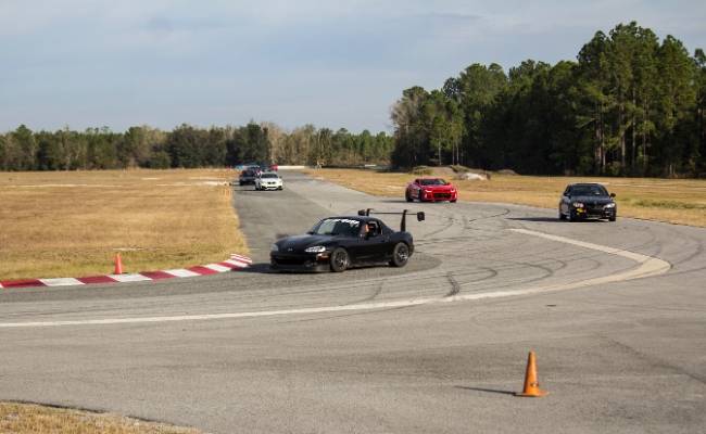 racing cars on track at Florida International Rally & Motorsport Park